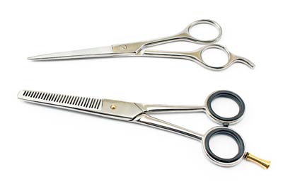 barbers scissors and texturising scissors used for a haircut